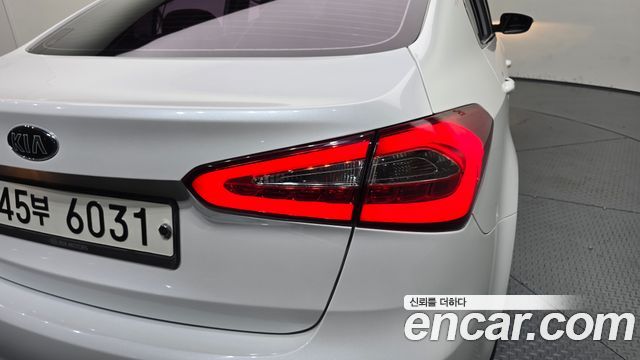 Kia K3 2015 — photo 9