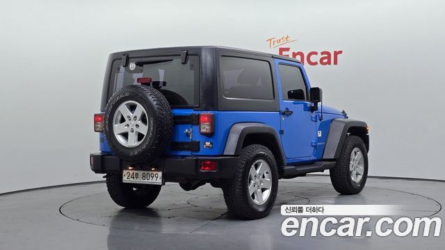 Jeep Wrangler 2011 — photo 2