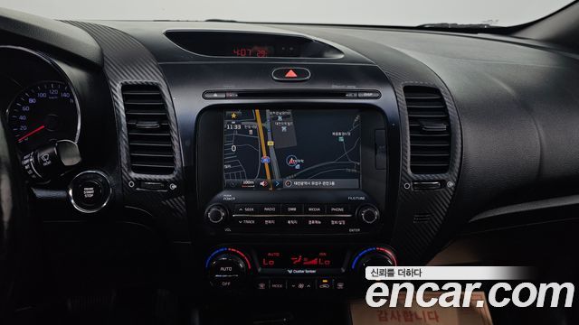Kia K3 2013 — photo 17