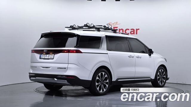 Kia Canival 2021 — photo 2