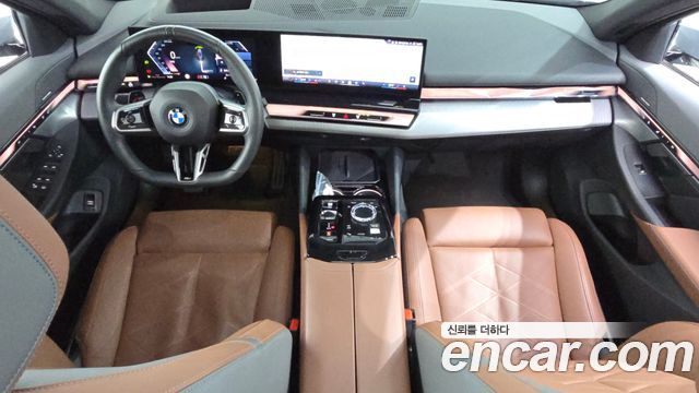 BMW 5-Series 2024 — photo 10