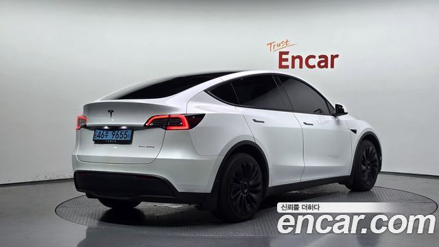 Tesla Model Y 2022 — photo 2