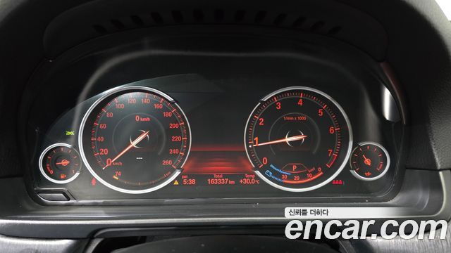 BMW 5-Series 2014 — photo 11