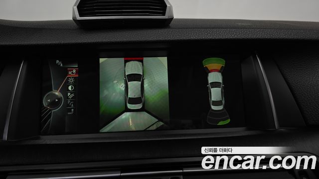 BMW 5-Series 2014 — photo 20