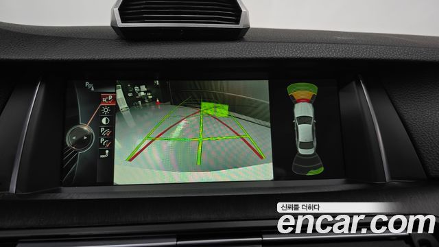 BMW 5-Series 2014 — photo 21