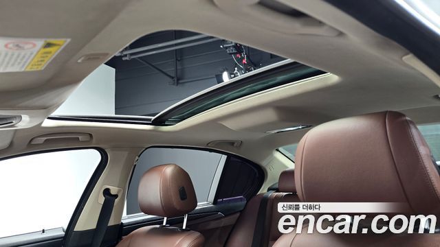 BMW 5-Series 2014 — photo 23