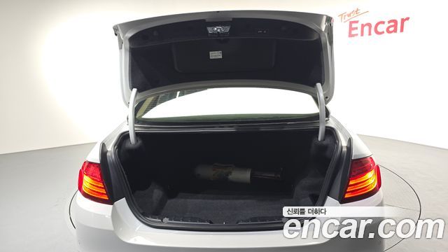BMW 5-Series 2014 — photo 25
