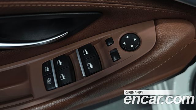BMW 5-Series 2014 — photo 29