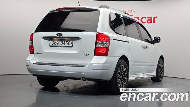 Kia Canival 2012 — photo 2