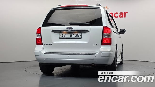 Kia Canival 2012 — photo 4