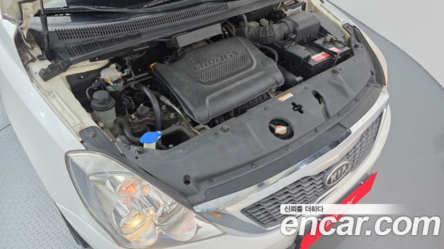 Kia Canival 2012 — photo 6