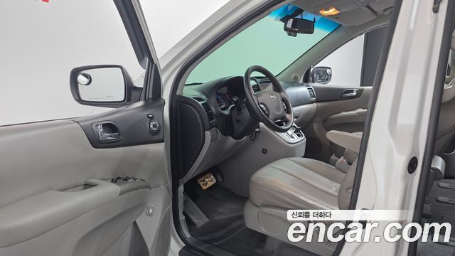 Kia Canival 2012 — photo 12