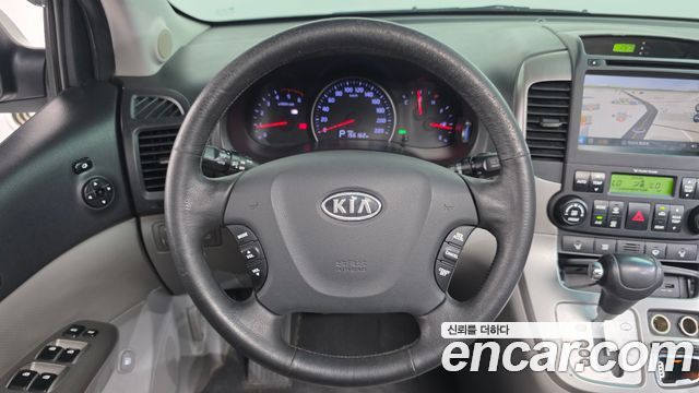 Kia Canival 2012 — photo 15