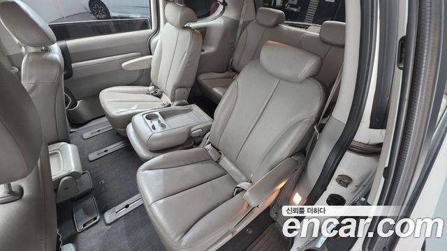 Kia Canival 2012 — photo 18