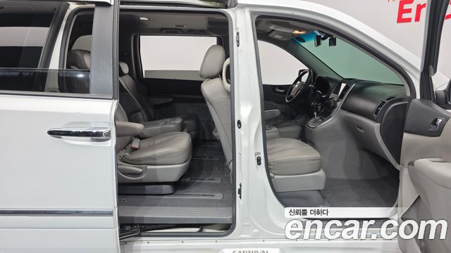 Kia Canival 2012 — photo 19
