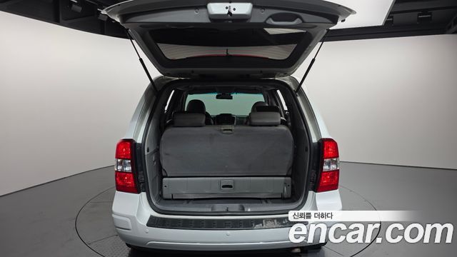 Kia Canival 2012 — photo 20