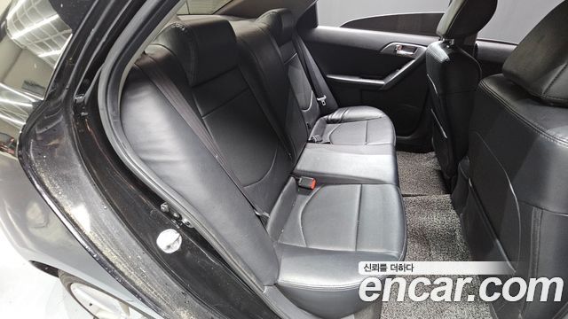 Kia Porte 2013 — photo 11