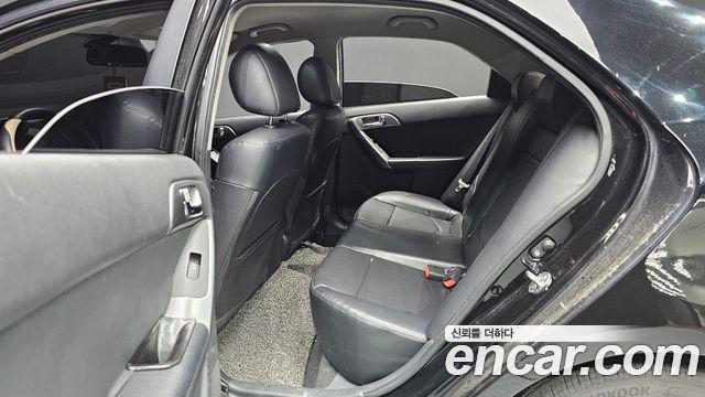 Kia Porte 2013 — photo 12