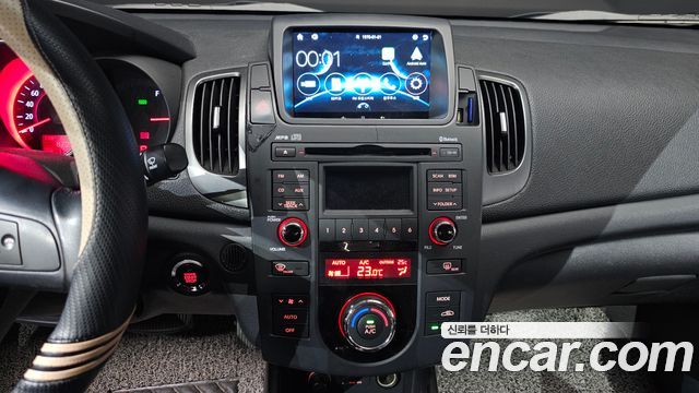 Kia Porte 2013 — photo 14