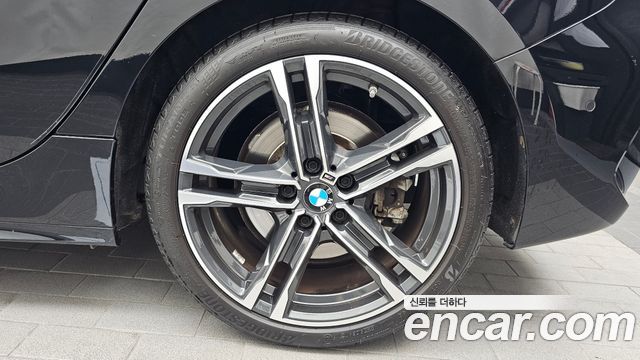 BMW 1-Series 2023 — photo 7