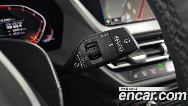 BMW 1-Series 2023 — photo 28