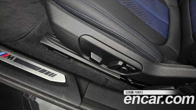 BMW 1-Series 2023 — photo 32