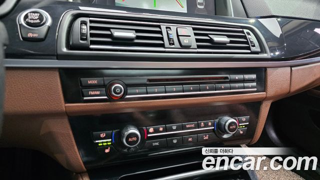 BMW 5-Series 2015 — photo 18