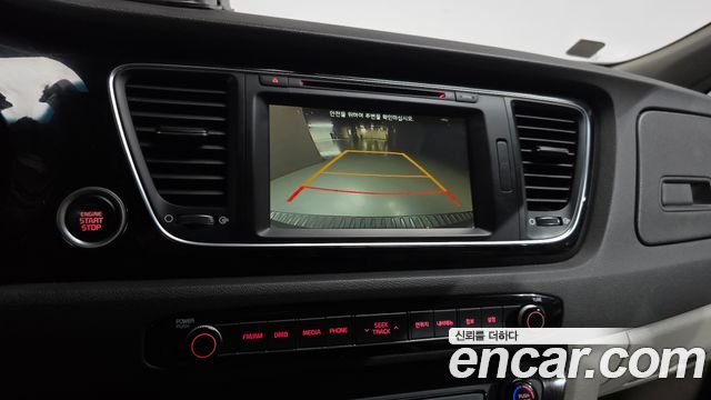Kia Canival 2015 — photo 21