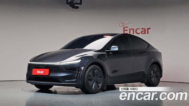 Tesla Model Y 2025 — photo 38