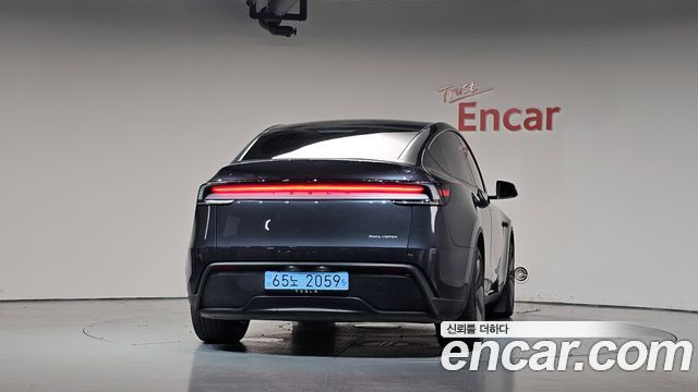 Tesla Model Y 2025 — photo 4