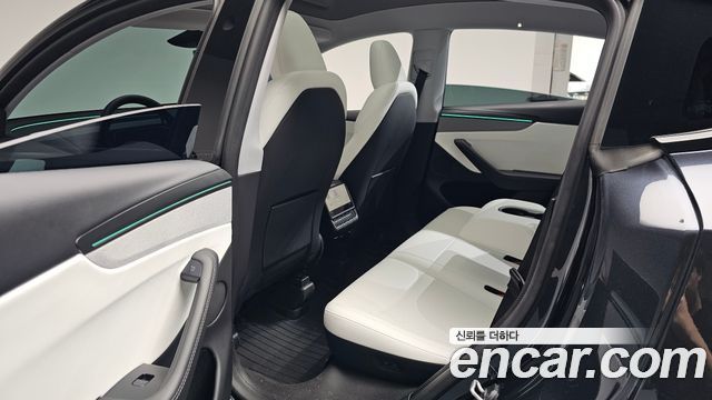 Tesla Model Y 2025 — photo 18