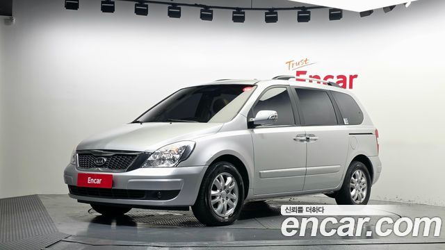 Kia Canival 2011 — photo 1