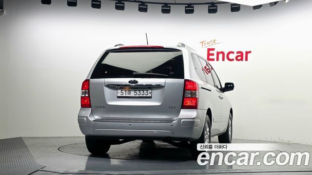 Kia Canival 2011 — photo 4
