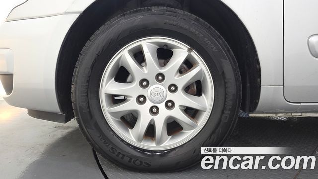 Kia Canival 2011 — photo 5