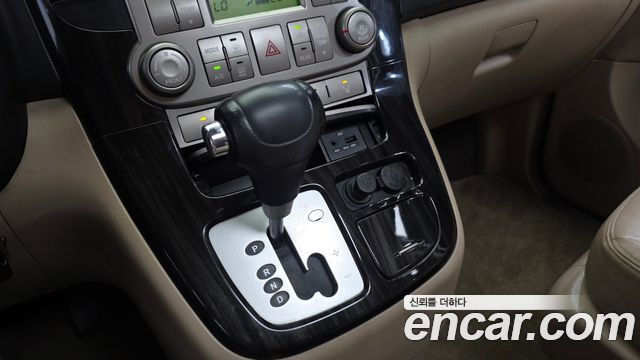 Kia Canival 2011 — photo 9