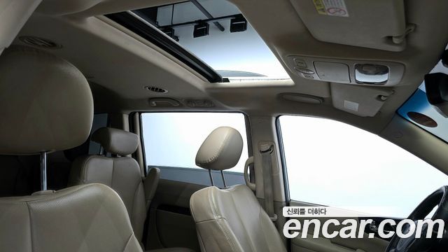 Kia Canival 2011 — photo 20