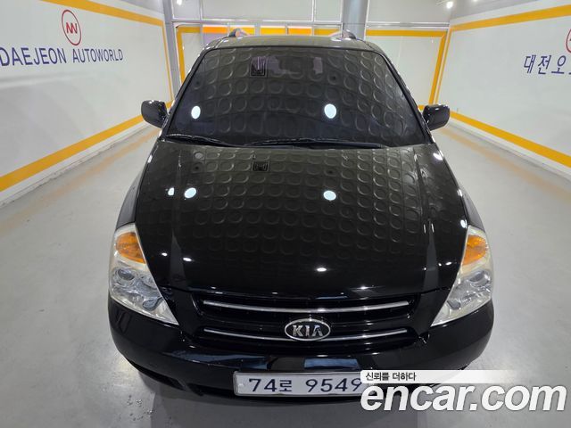 Kia Canival 2010 — photo 2
