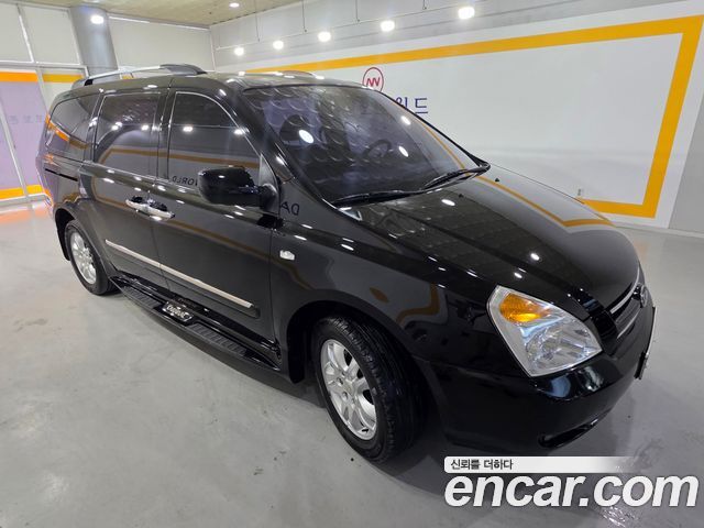Kia Canival 2010 — photo 3
