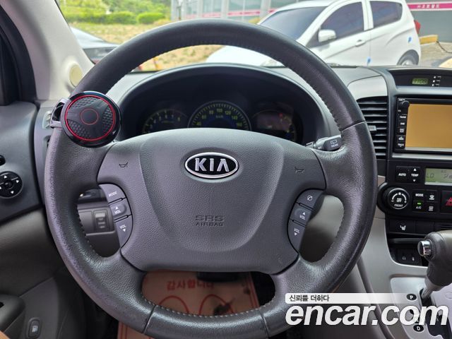 Kia Canival 2010 — photo 5