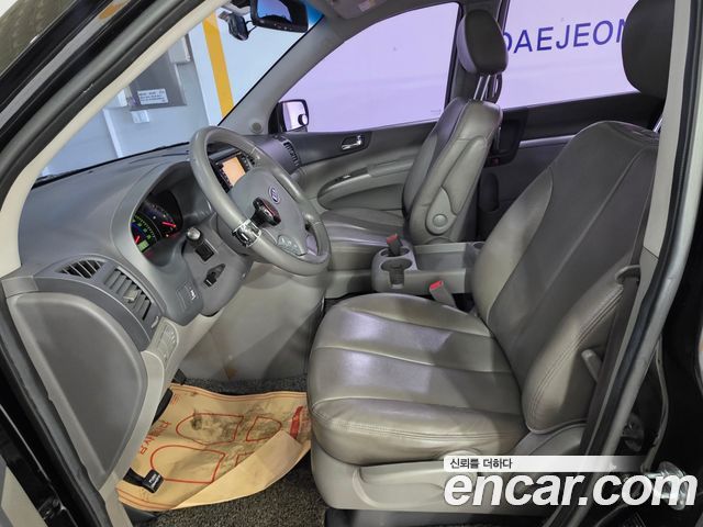 Kia Canival 2010 — photo 6
