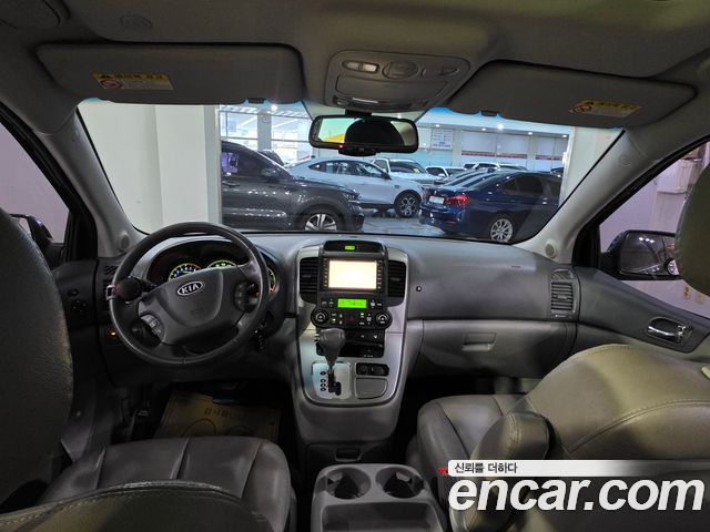 Kia Canival 2010 — photo 16
