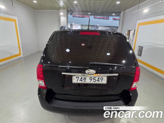 Kia Canival 2010 — photo 19