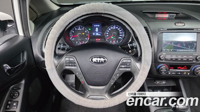 Kia K3 2015 — photo 14