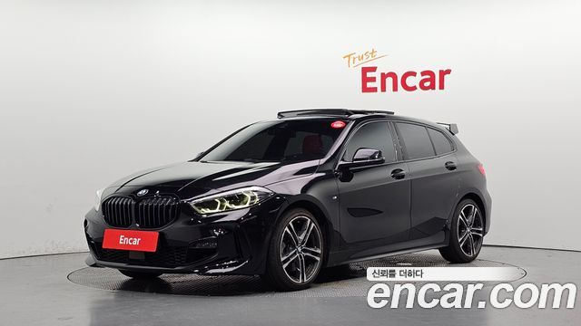 BMW 1-Series 2022 — photo 1