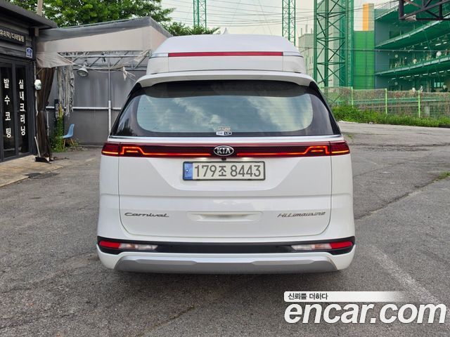 Kia Canival 2021 — photo 2