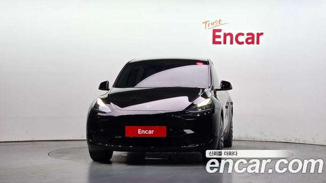 Tesla Model Y 2024 — photo 3