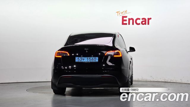 Tesla Model Y 2024 — photo 4