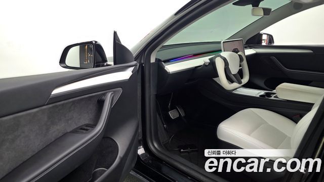 Tesla Model Y 2024 — photo 13