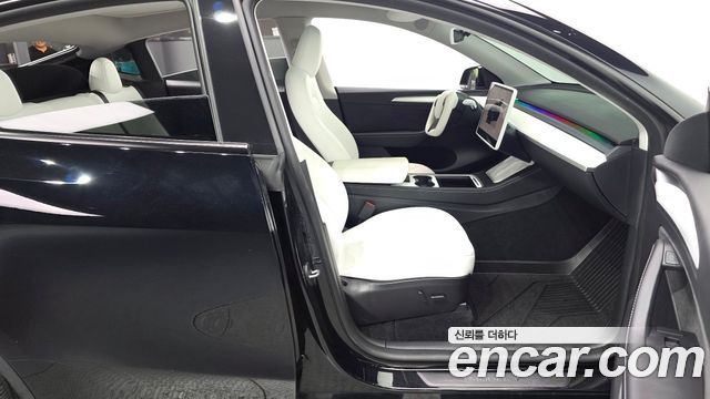 Tesla Model Y 2024 — photo 17