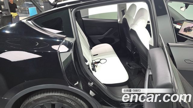 Tesla Model Y 2024 — photo 18
